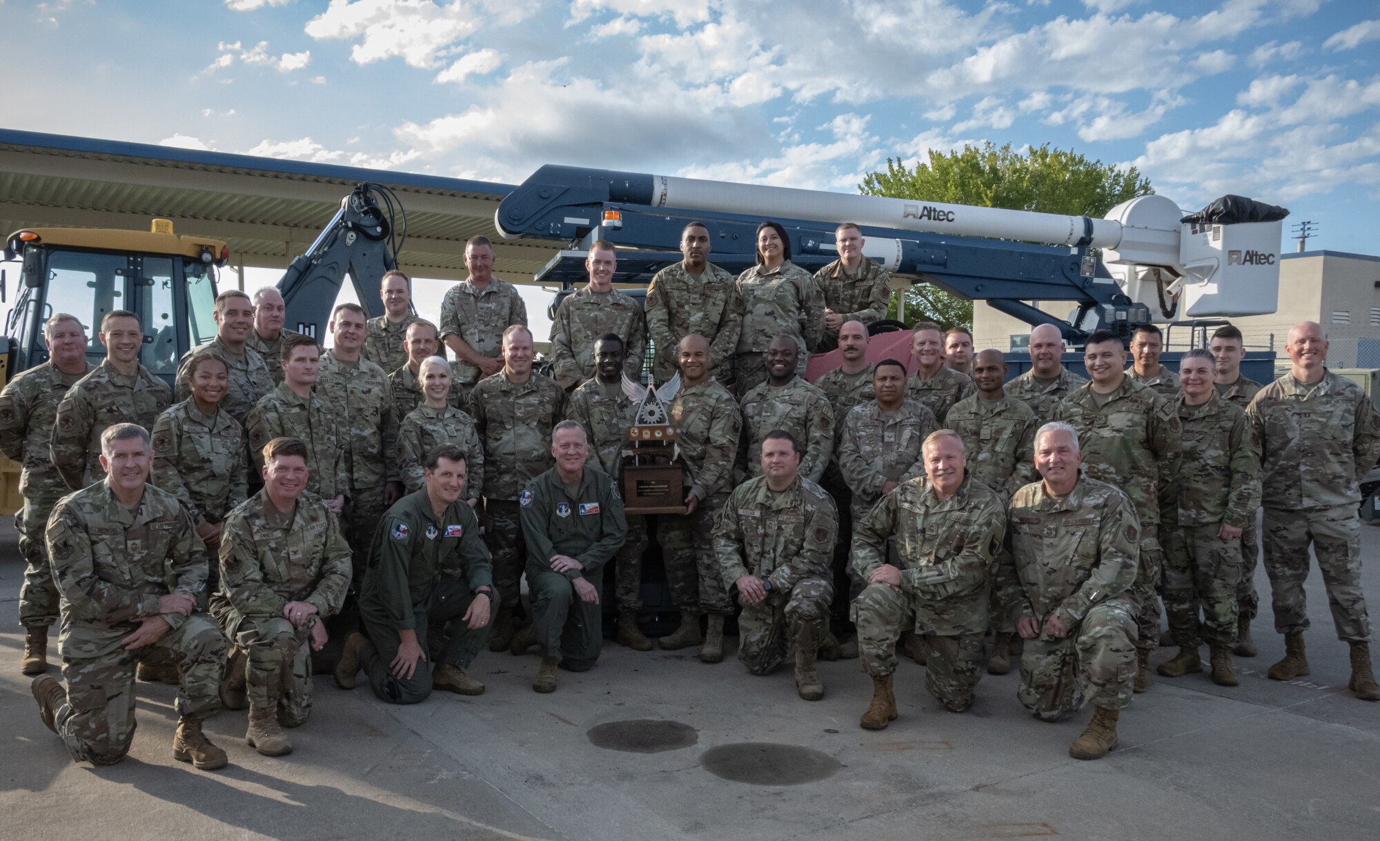 136 CES Airmen pose with trophy.