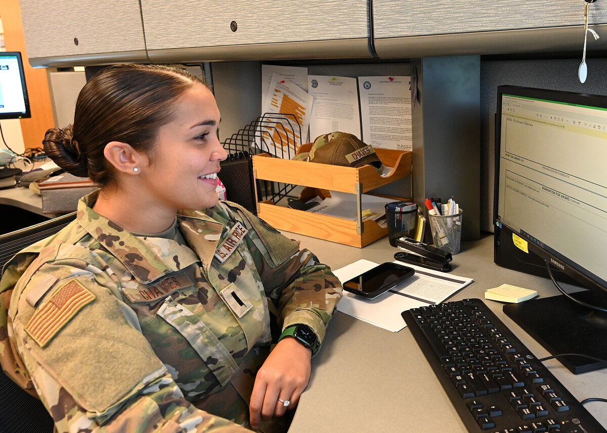 U.S. Air Force 1st Lt Andrea Chaves, 175th Medical Group clinical nurse, works at her desk at Warfield Air National Guard Base at Martin State Airport, Middle River, Maryland, September 11, 2022.