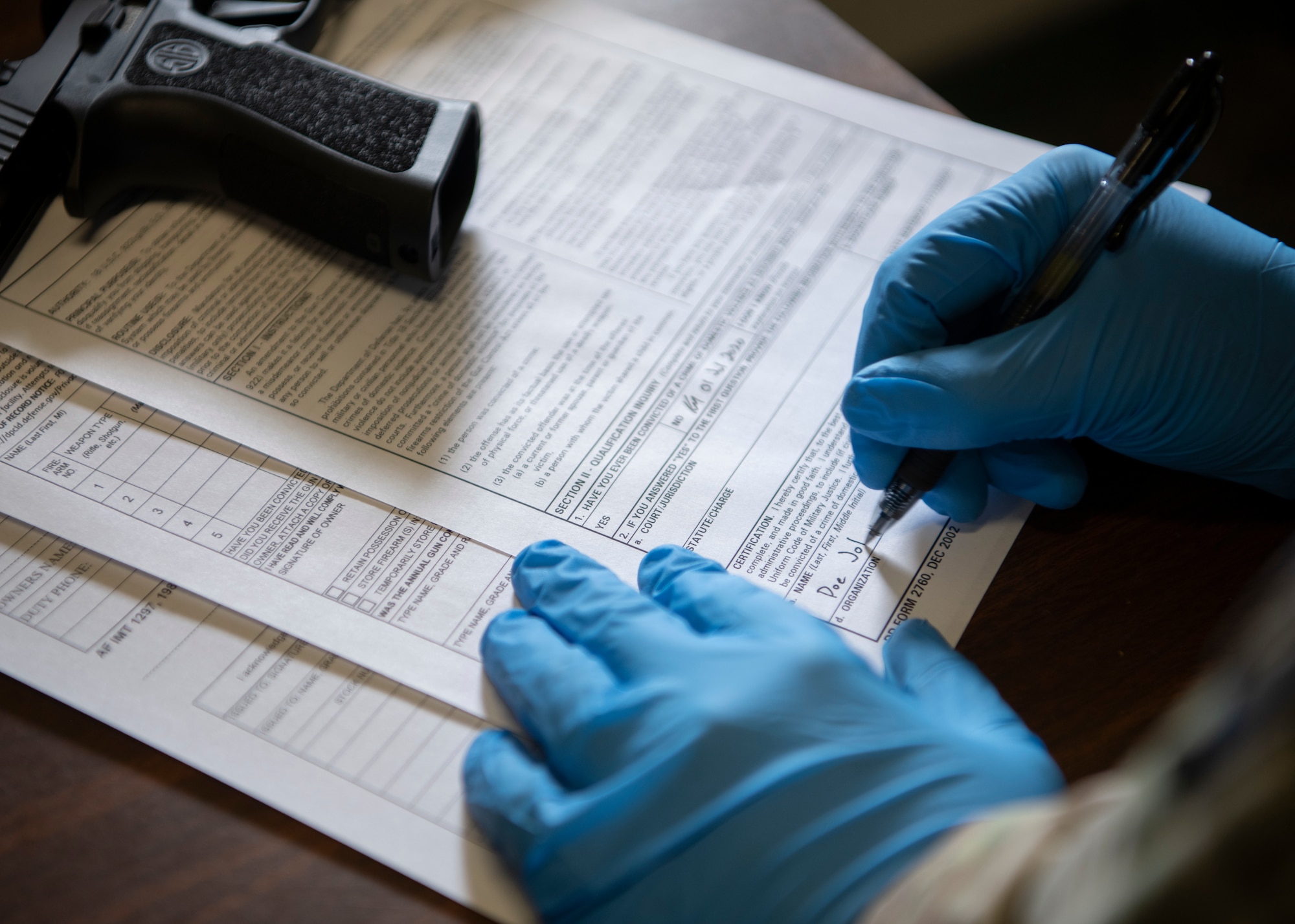 Massachusetts law requires that any person possessing handguns, large-capacity rifles, and/or shotguns must have a Class A License to Carry. For those entering Hanscom Air Force Base, Mass., firearms must be declared to the entry controller and immediately registered with the 66th Security Forces Squadron. Those living on-base must store their personally-owned firearms in a secure container at their residence or at the SFS armory. (U.S. Air Force photo by Senior Airman Cheyenne Larkin)
