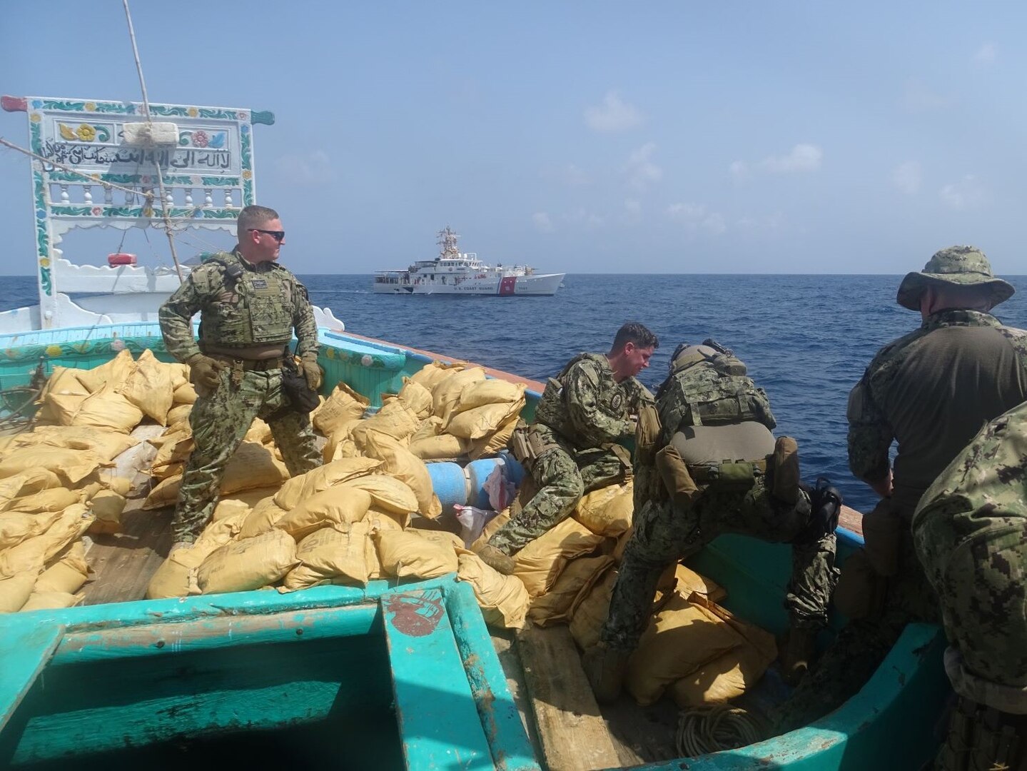 GULF OF OMAN (Sept. 27, 2022) A U.S. Coast Guard interdiction team seizes bags of illegal narcotics from a fishing vessel interdicted by fast response cutter USCGC Charles Moulthrope (WPC 1141) in the Gulf of Oman, Sept. 27.