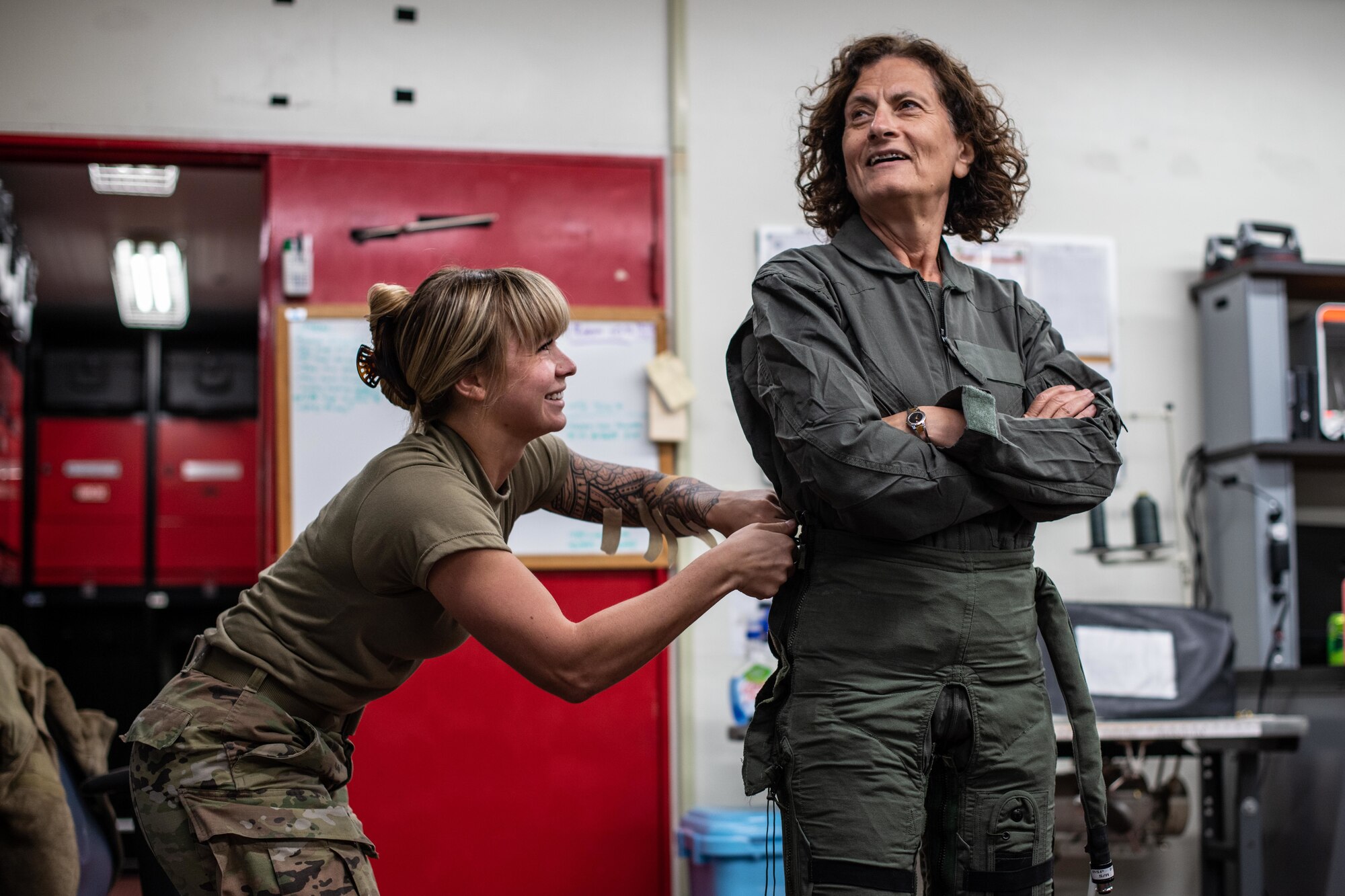 Doctor gets her flight suit fitted.