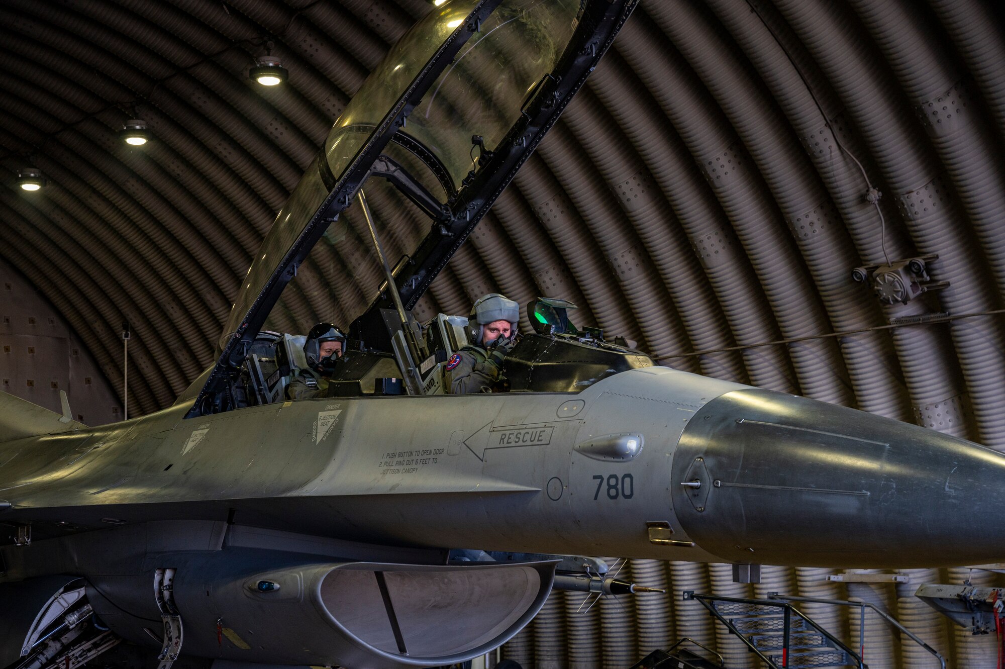 U.S. Air Force Maj. Daniel Wynn, 36th Fighter Generation Squadron director of operations, and Dr. Victoria Coleman, USAF Chief Scientist, prepare for a familiarization flight in an F-16 Fighting Falcon at Osan Air Base, Republic of Korea, Sept. 23, 2022.