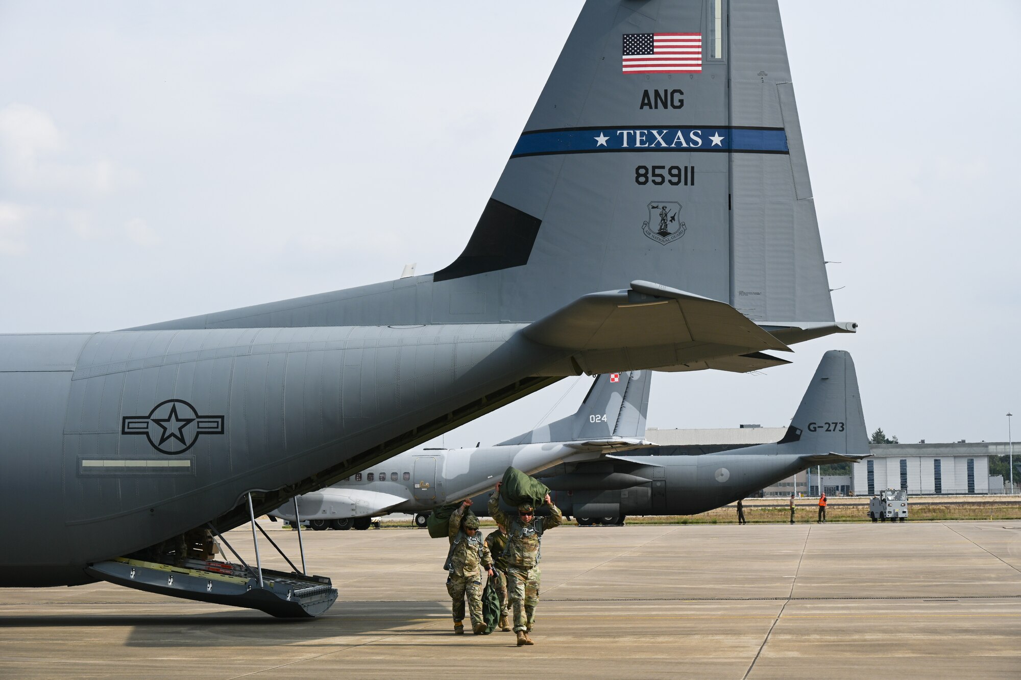 Army rigger team exit C-130J.