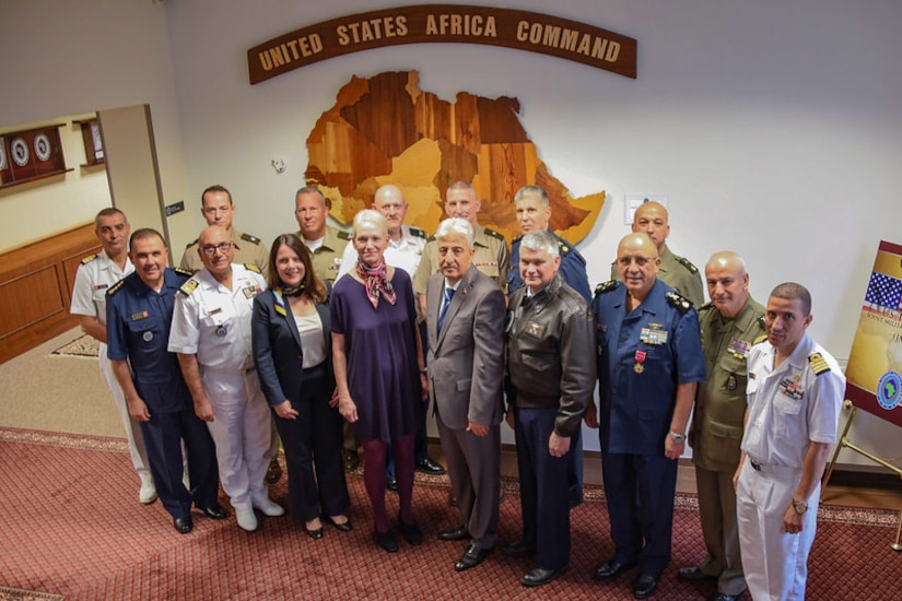 A group of people pose for a photo.