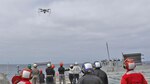 The Navy conducts a demonstration aboard USS Paul Hamilton (DDG-60) July 12 to identify and examine Unmanned Air Systems (UAS) capable of wide-area missions from a Navy vessel at long ranges for extended periods while sending information back to the vessel.