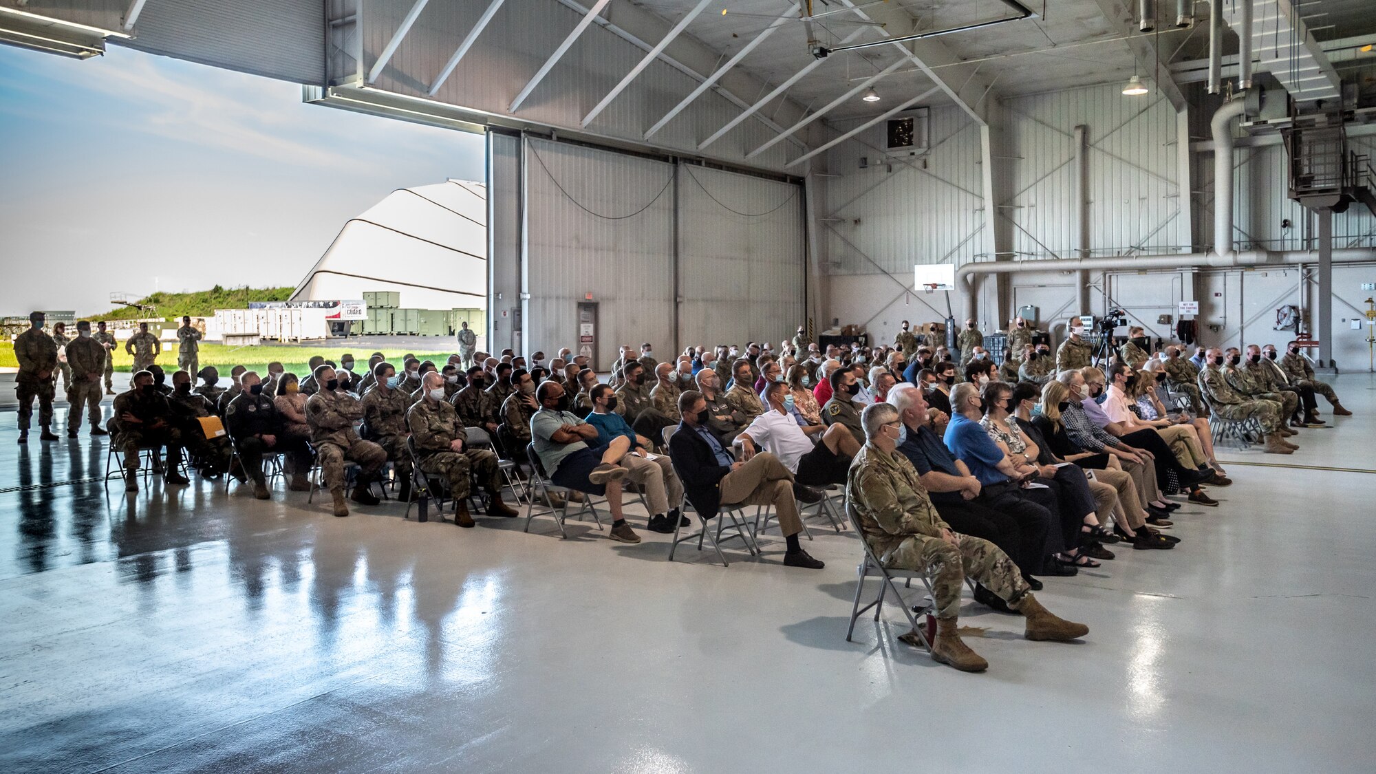 Hundreds of Airmen, colleagues and family members attend a retirement ceremony at the Kentucky Air National Guard Base in Louisville, Ky., Aug. 13, 2022, for Brig. Gen. Jeffrey L. Wilkinson, outgoing assistant adjutant general for Air. A career special tactics officer, Wilkinson served the Air Force and Air National Guard for more than 28 years. (U.S. Air National Guard photo by Dale Greer)