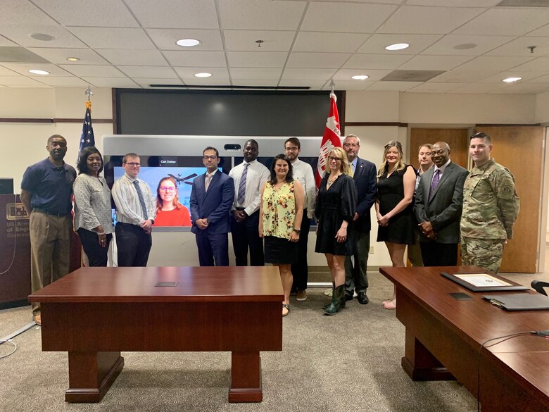 Graduates of the U.S. Army Corps of Engineers, Savannah District Leadership Development Program Level 2 pose for a group photograph with Maj. Alex Duffy, deputy commander, during a graduation ceremony, Sept. 22 at the district headquarters. Shown from left to right: Craig Boles, Natasha Givens, Ian Wright, Rebecca Downey, Roger Ruppe, Shahidou Mariko, Anna Godfrey, Clayton Crider, Nicole Liette, Carl Dokter, Emily Cromie, Matthew Deacon and Curtis McKenzie. (USACE Photo by Rashida Banks)