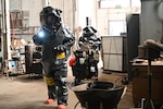 U.S. Army Sgt. Zachary Lutz and Sgt. Rainee Malle, 8th Weapons of Mass Destruction-Civil Support Teams, Colorado National Guard, assess a potential biohazard contamination site during Joint Exercise Western Sugar Response, Aug. 30, 2022, Scottsbluff, Nebraska. Civil support teams from the Nebraska and Wyoming National Guard also participated in the exercise with local first responders.