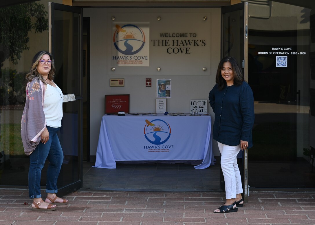Mona Martin, Sexual Assault Prevention and Response and Victim Advocate civilian and Pauline Chui, Community Support coordinator starts to prepare the office for the upcoming grand opening of the Hawk’s Cove Integrated Resilience Operations Center at Vandenberg Space Force Base, Calif., Sept. 9, 2022. (U.S. Space Force photo by Airman 1st Class Tiarra Sibley)
