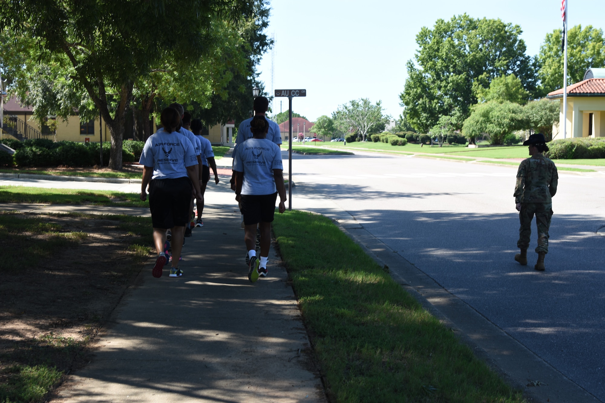 a military training instructor marches recruits