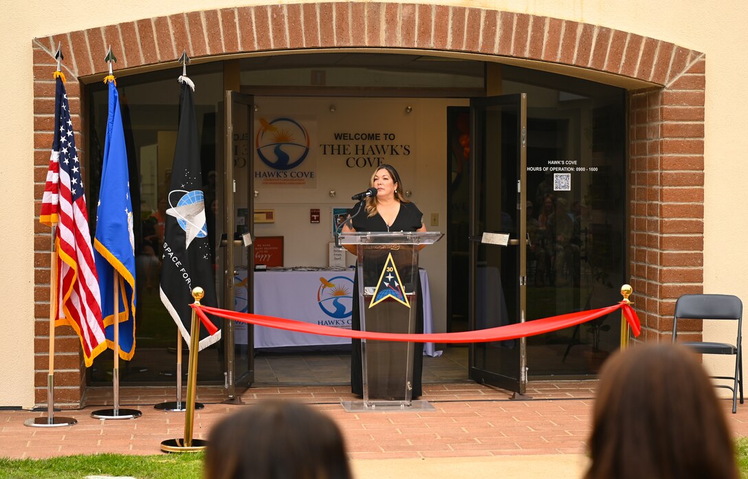 Mona Martin, Sexual Assault Prevention and Response and Victim Advocate, greets the distinguished guests at the grand opening of the Hawk’s Cove Integrated Resilience Operation Center at Vandenberg Space Force Base, Calif., Sept. 27, 2022. (U.S. Space Force photo by Airman 1st Class Tiarra Sibley)