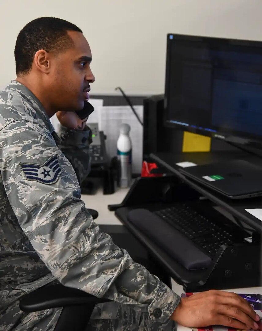 Staff Sergeant LeWillie Neal, 2nd Force Support Squadron NCO in charge of outbound assignments, assists a client virtually at Barksdale Air Force Base, La., May 21, 2020. The outbound assignments team has processed orders for over 500 Airmen in the midst of COVID-19. (U.S. Air Force photo by Senior Airman Christina Rios)