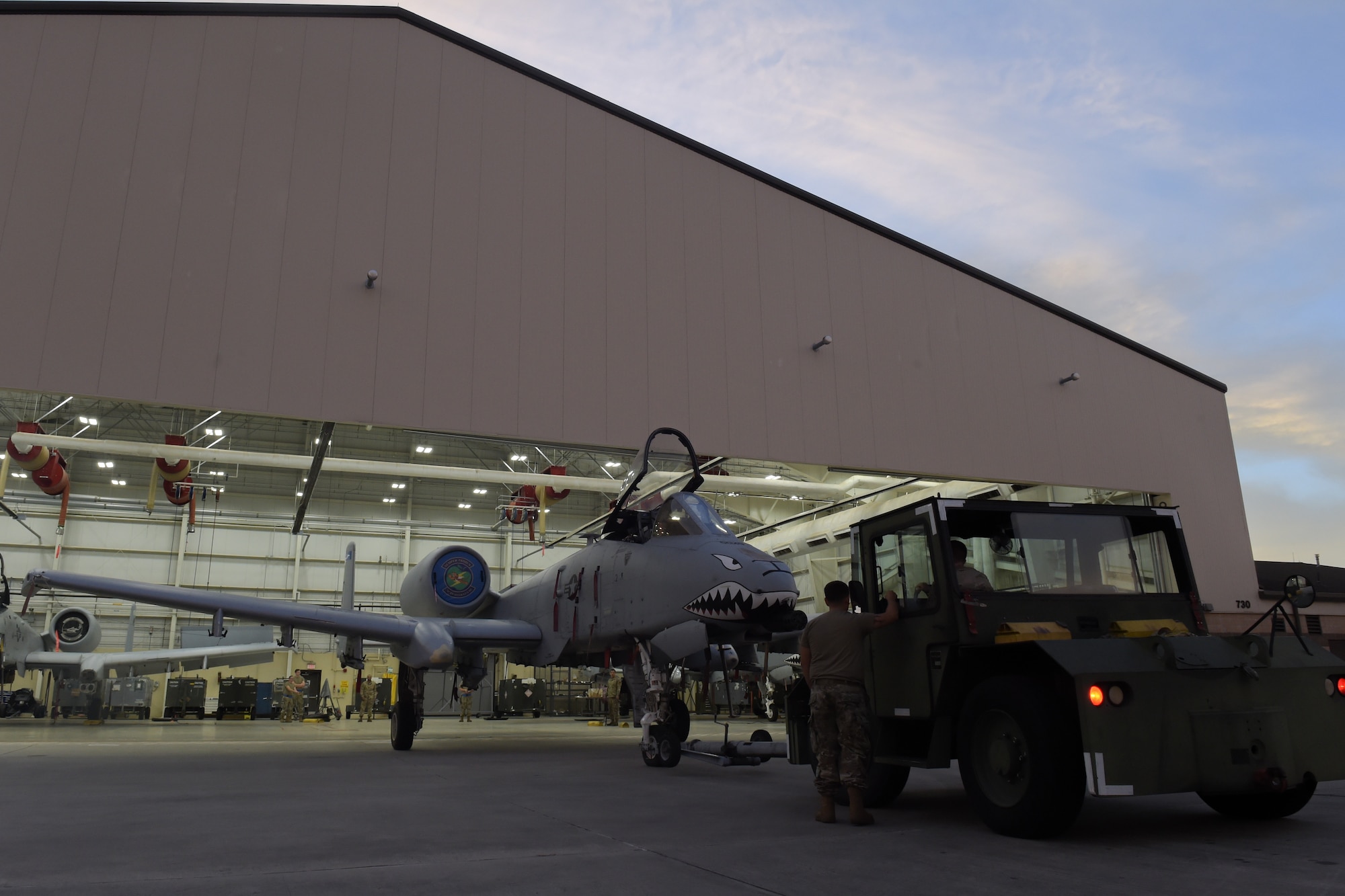 Photo of vehicle towing aircraft