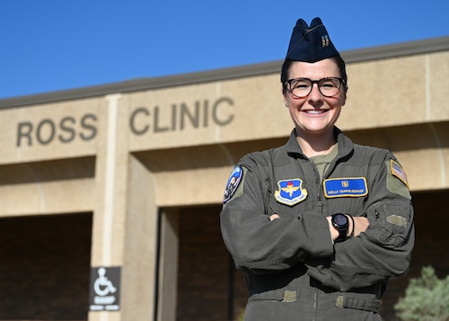 U.S. Air Force Capt. Molly Dunkelberger, 17th Medical Group aerospace nurse practitioner, poses in front of Ross Clinic on Goodfellow Air Force Base, Texas June 28, 2022. Dunkelberger serves as the primary care manager for the 17th Security Forces Squadron. (U.S. Air Force photo by 2nd Lt. Steve Garrett)