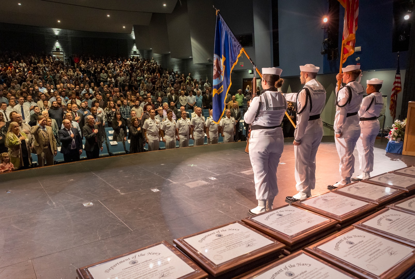 The Naval Medicine Readiness and Training Command Color Guard present colors during the Puget Sound Naval Shipyard & Intermediate Maintenance Facility Apprentice Program graduation ceremony held Sept. 23, 2022, at the Bremerton High School Performing Arts Center, in Bremerton, Wash.  (U.S. Navy Photo by Wendy Hallmark)
