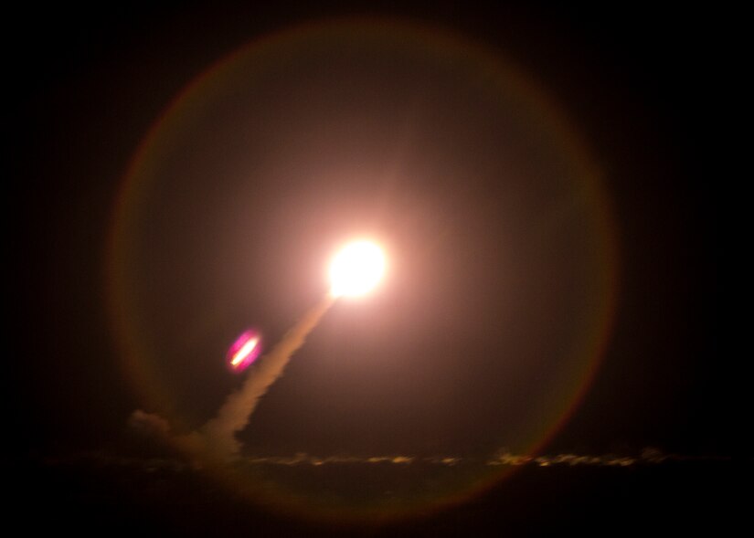 A rocket launches in a ball of fire.