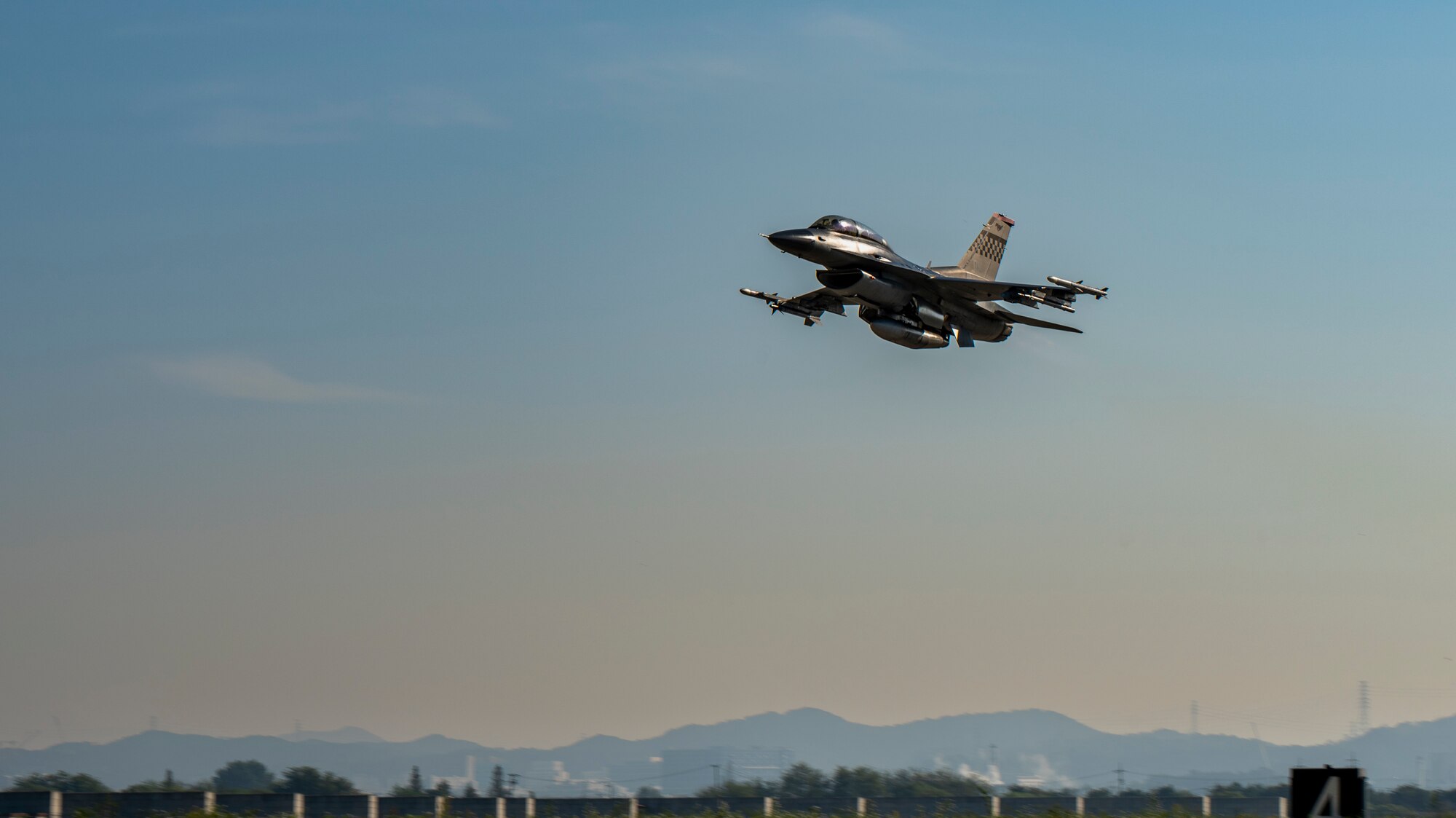 An F-16 Fighting Falcon assigned to the 36th Fighter Squadron takes off as part of a familiarization flight for Dr. Victoria Coleman, USAF Chief Scientist, at Osan Air Base, Republic of Korea, Sept. 23, 2022.
