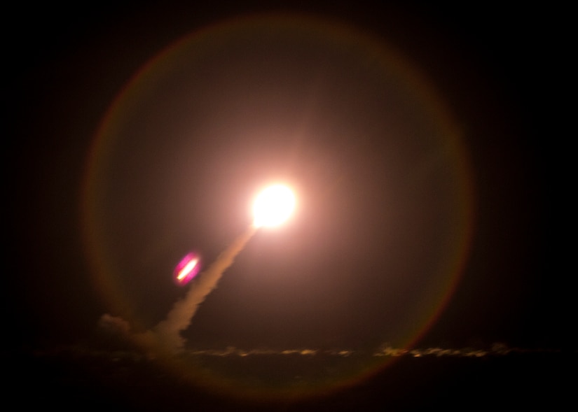 A rocket launches in a ball of fire.