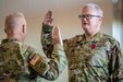 Army Maj. Gen. Haldane B. Lamberton, left, adjutant general of the Commonwealth of Kentucky, administers the oath of office to Brig. Gen. David J. Mounkes, assistant adjutant general for Air, during a promotion and change-of-command ceremony at the Kentucky Air National Guard Base in Louisville, Ky., Aug. 13, 2022. Mounkes assumed command of the Kentucky Air Guard at the event, taking on the role of assistant adjutant general for Air from Brig. Gen. Jeffrey L. Wilkinson, who is retiring. (U.S. Air National Guard photo by Dale Greer)