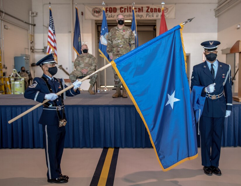 Members of the 123rd Airlift Wing Color Guard unfurl the personal flag of Brig. Gen. David J. Mounkes during a promotion and change-of-command ceremony held at the Kentucky Air National Guard Base in Louisville, Ky., Aug. 13, 2022. Mounkes assumed command of the Kentucky Air Guard at the event, taking on the role of assistant adjutant general for Air from Brig. Gen. Jeffrey L. Wilkinson, who is retiring. (U.S. Air National Guard photo by Staff Sgt. Chloe Ochs)