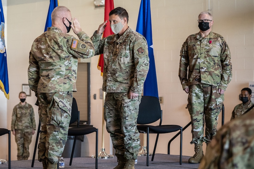 Brig. Gen. Jeffrey L. Wilkinson, center, outgoing assistant adjutant general for Air, renders his final salute to Army Maj. Gen. Haldane B. Lamberton, left, adjutant general of the Commonwealth of Kentucky, during Wilkinson’s retirement ceremony at the Kentucky Air National Guard Base in Louisville, Ky., Aug. 13, 2022, as Brig. Gen. David Mounkes, incoming assistant adjutant general for Air, looks on. A career special tactics officer, Wilkinson served the Air Force and Air National Guard for more than 28 years. (U.S. Air National Guard photo by Dale Greer)