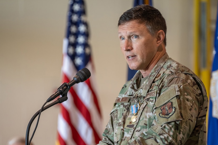 Brig. Gen. Jeffrey L. Wilkinson, outgoing assistant adjutant general for Air, speaks to audience members during his retirement ceremony at the Kentucky Air National Guard Base in Louisville, Ky., Aug. 13, 2022. A career special tactics officer, Wilkinson served the Air Force and Air National Guard for more than 28 years. (U.S. Air National Guard photo by Dale Greer)