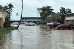 View of flooding outside buildings.