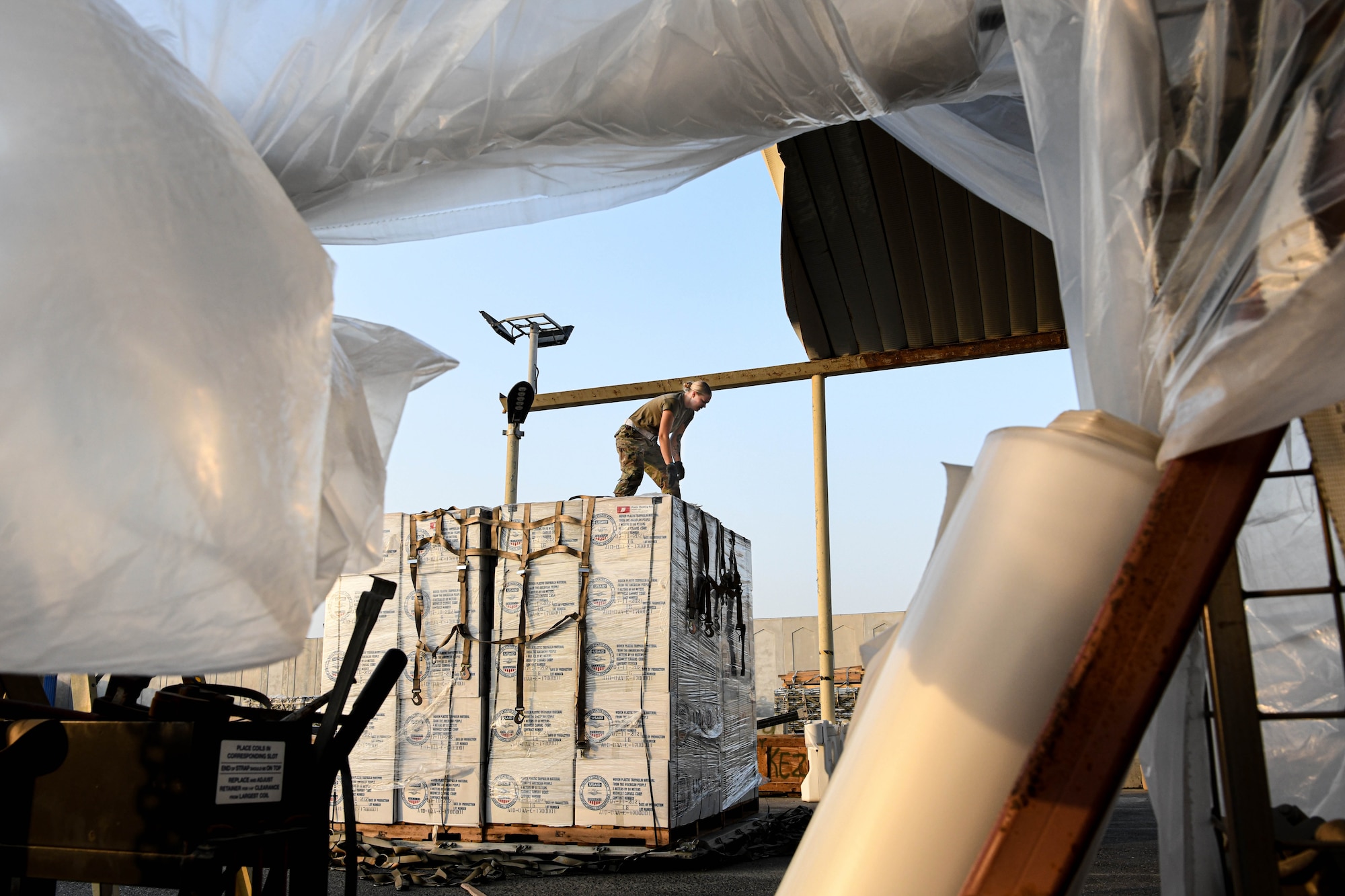 The 380th Expeditionary Logistics Readiness Squadron prepared and palletized more than 1.4 million pounds of humanitarian relief cargo, provided by the U.S. Agency for International Development, September 8-12, 2022 at Al Dhafra Air Base, United Arab Emirates. More than 40 Airmen from across the 380th ELRS pitched in to prepare palletized cargo for 14 individual C-17 Globemaster sorties to Pakistan, some flights holding as much as 90,000 pounds. Relief items included kitchen sets, shelter building kits, tarps and plastic sheeting.