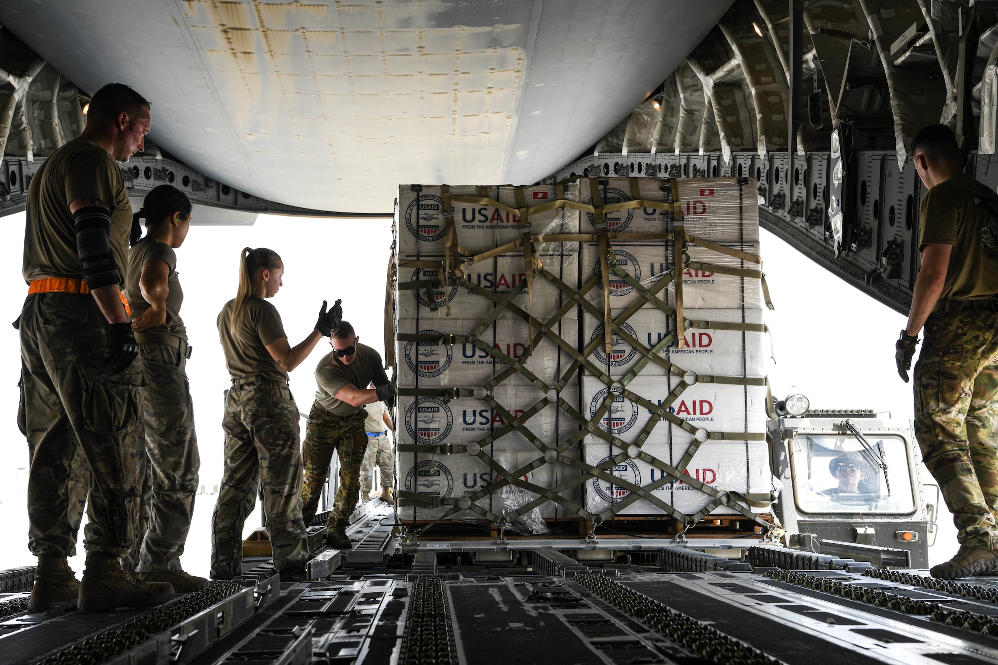 The 380th Expeditionary Logistics Readiness Squadron prepared and palletized more than 1.4 million pounds of humanitarian relief cargo, provided by the U.S. Agency for International Development, September 8-12, 2022 at Al Dhafra Air Base, United Arab Emirates. More than 40 Airmen from across the 380th ELRS pitched in to prepare palletized cargo for 14 individual C-17 Globemaster sorties to Pakistan, some flights holding as much as 90,000 pounds. Relief items included kitchen sets, shelter building kits, tarps and plastic sheeting.