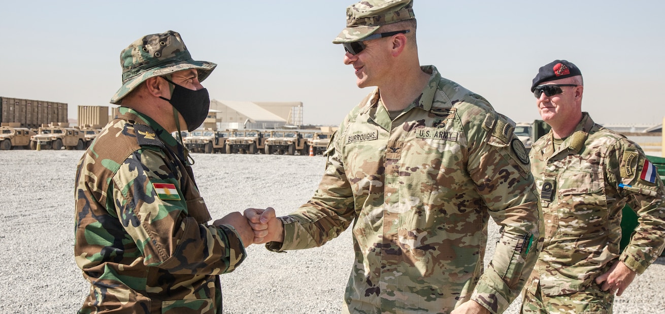 Members of the Peshmerga Regional Guard Brigade receive shipments of humvees from U.S. Coalition counterparts via the Counter-ISIS Train and Equip Fund (CTEF) program, Erbil, Iraq., Sep. 22, 2021. The CTEF program provides our partner forces with equipment to enhance overall strength and capabilities in defeating Daesh and emphasizes the Coalition's commitment to ensure their defeat. (U.S. Army photo by Spc. Trevor Franklin)