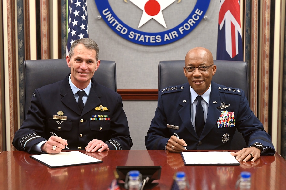 Air Force Chief of Staff Gen. CQ Brown, Jr., and Royal Australian Air Force Air Marshal Rob Chipman sign a Joint Vision Statement, Pentagon, Arlington, Va., Sept 14, 2022.. (U.S. Air Force photo by Andy Morataya)