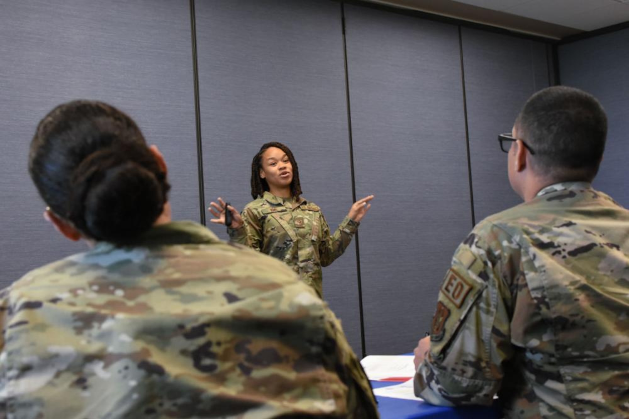 Senior Airman Maleya Neall, 301st Communications Squadron, radio frequency technician, does teach-back on mindfulness during a Resiliency Training Assistant course at Naval Air Station Joint Reserve Base Fort Worth, Texas, Sept. 8, 2022. The students taught what they learned as the instructors critiqued their presentation. (U.S. Air Force photo by Staff Sgt. Randall Moose)