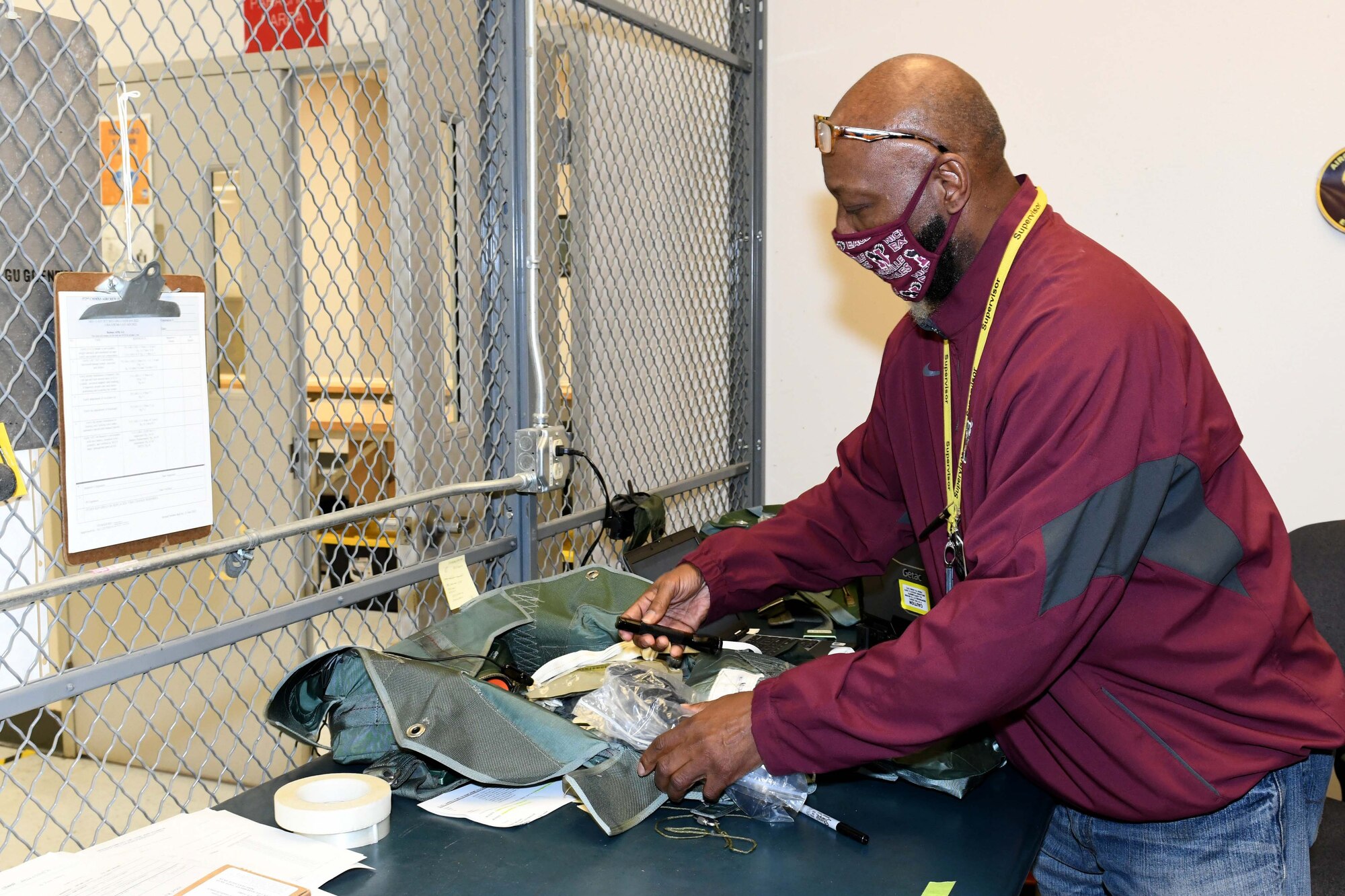 Man inspecting equipment