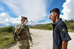 Capt. Madison Bips, a member of the Georgia National Guard's 1st Battalion of the 54th Security Force Assistance Brigade, returns a salute from a member of the Honduran Armed Forces Sept. 8, 2022, near Tegucigalpa, Honduras. The 54th SFAB was deployed to Honduras for six months in the first National Guard deployment of its kind.