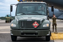 Airmen refuel aircraft prior to takeoff.