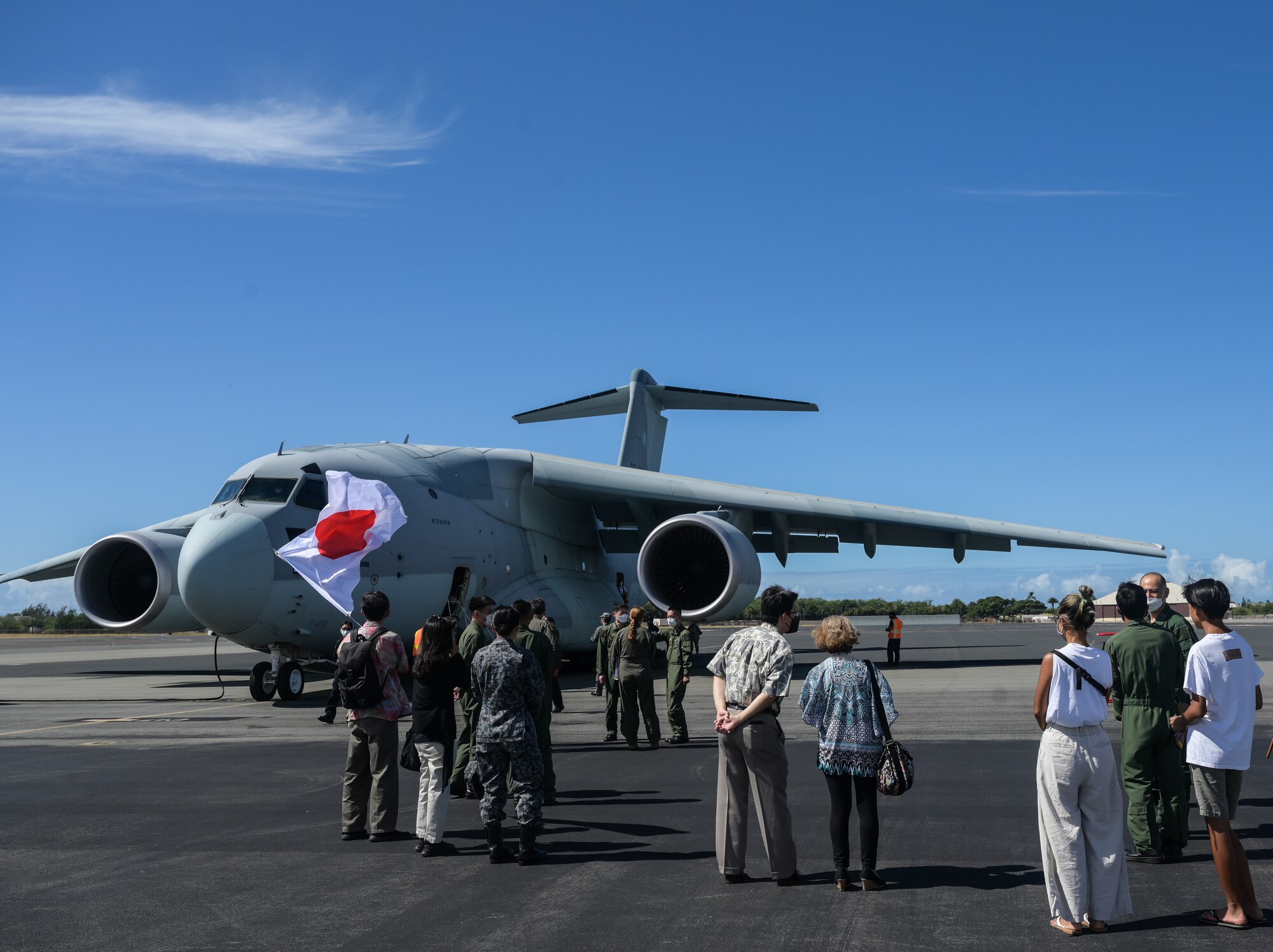 Airmen assigned to U.S. Pacific Air Forces and members of United Japanese Society of Hawaii welcome Japan Air Self-Defense Force leadership at Joint Base Pearl Harbor-Hickam, Hawaii, Sept. 25, 2022. Airmen assigned to the JASDF 403rd Tactical Airlift Squadron and PACAF’s 535th Airlift Squadron are participating in the first bilateral exercise between the squadrons, increasing interoperability and familiarizing both services with the Kawasaki C-2 and C-17 Globemaster III. (U.S. Air Force photo by Staff Sgt. Alan Ricker)