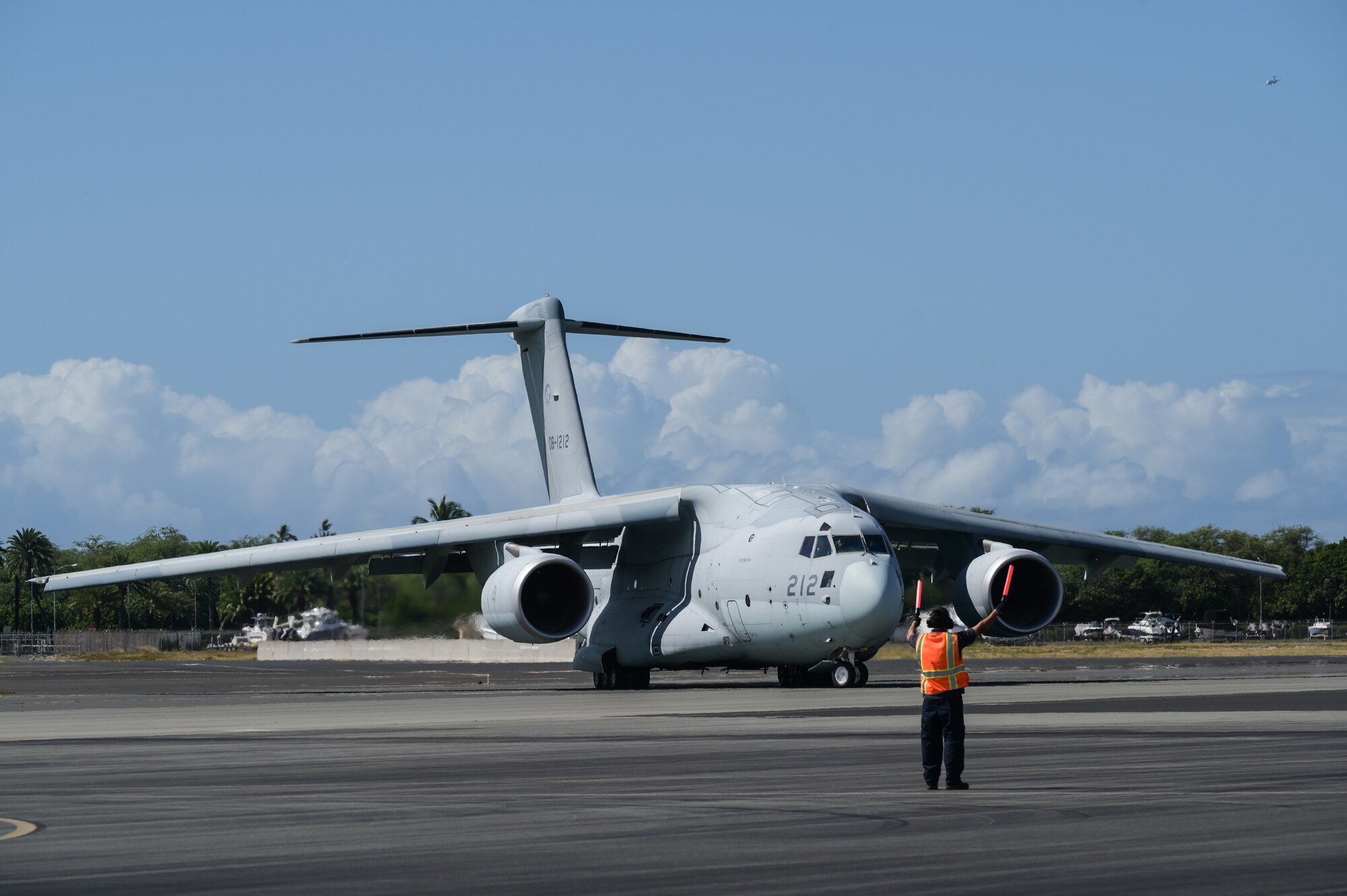 Kawasaki C-2 taxis on an airfield at Joint Base Pearl Harbor-Hickam, Hawaii, Sept. 25, 2022. The C-2, assigned to the JASDF 403rd Tactical Airlift Squadron, will be utilized during a 3-day bilateral exercise along with the 535th Airlift Squadron and the C-17 Globemaster III. Combined exercises between the USAF and JASDF advances the operational concepts and capabilities of both countries.  (U.S. Air Force photo by Staff Sgt. Alan Ricker)