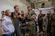 Airmen from the 23rd Expeditionary Bomb Squadron disembark a jet and are greeted by base leadership on the flightline at Minot Air Force Base, North Dakota, Sept. 24, 2022. The 23rd BS personnel were deployed to RAF Fairford, England in support of United States in Europe and Air Forces Africa command. (U.S. Air Force photo by Senior Airman Zachary Wright)