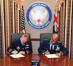 Air Force Chief of Staff Gen. CQ Brown, Jr., and Royal Australian Air Force Air Marshal Rob Chipman sign a Joint Vision Statement, Pentagon, Arlington, Va., Sept 14, 2022..