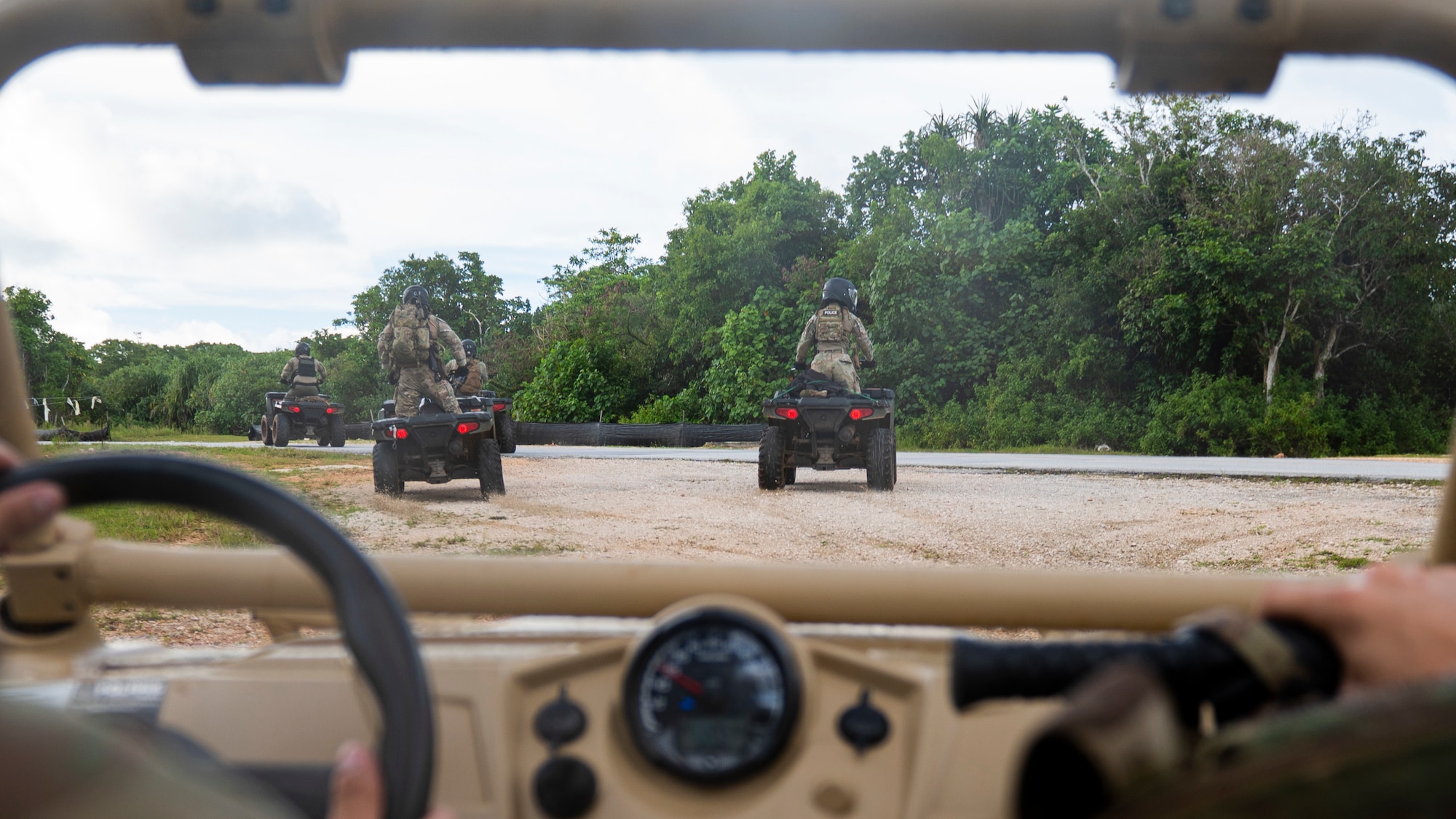 Members of the 36th Security Forces Squadron’s Jungle Enforcement Team perform perimeter checks with all-terrain vehicles on Andersen Air Force Base, Guam, Sep. 22, 2022. The JET travels on ATVs because it allows them to go further and maneuver better through the jungle. (U.S. Air Force photo by Airman Spencer Perkins)