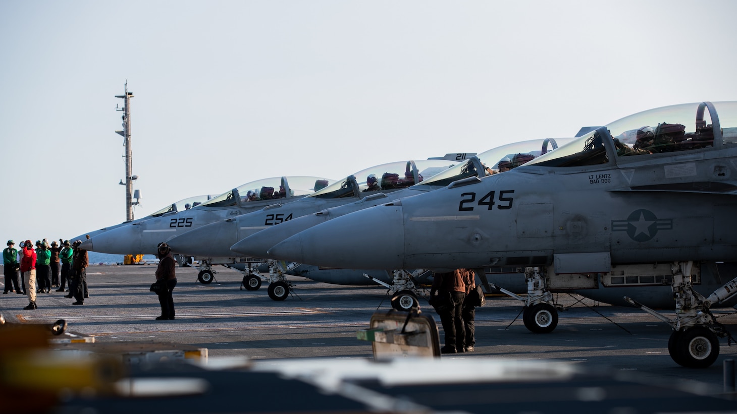 ATLANTIC OCEAN - F/A-18F Super Hornets, attached to the "Gladiators" of Strike Fighter Squadron (VFA) 106, sit on USS Gerald R. Ford’s (CVN 78) flight deck, prior to flight operations, Sept. 16, 2022. Ford is underway in the Atlantic Ocean conducting carrier qualifications and workups for a scheduled deployment this fall. (U.S. Navy photo by Mass Communication Specialist 3rd Class Grant Gorzocoski)