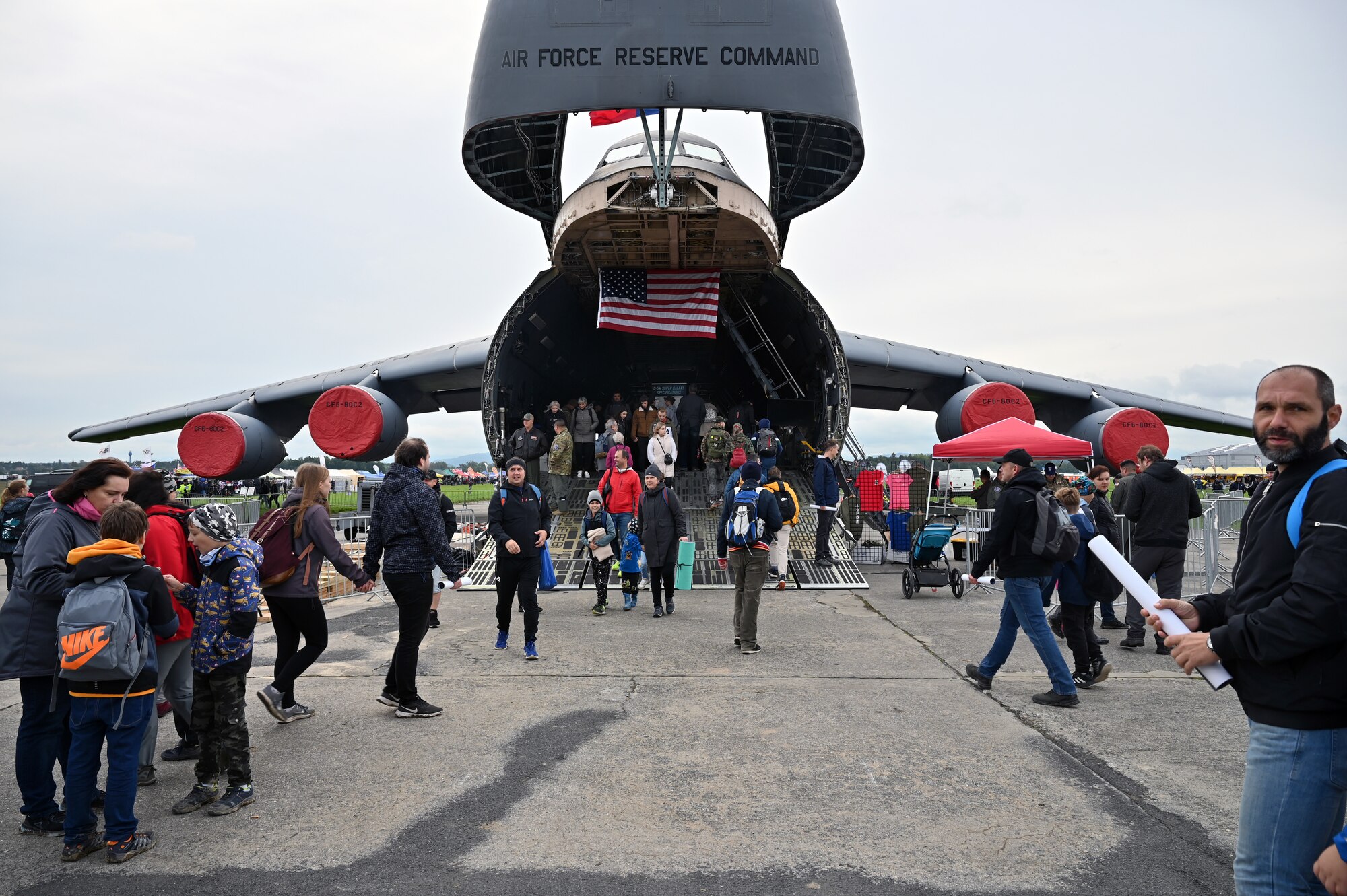 Guests walk through a C-5M Super Galaxy aircraft during the NATO Days air show in Ostrava, Czech Republic, Sept. 17, 2022. More than 110,000 people attended the event over two days. (U.S. Air Force photo by Staff Sgt. Monet Villacorte)