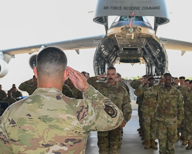 Maj. Nicholas Velazquez Jr., 433rd Aircraft Maintenance Squadron commander, renders his first salute to the 433rd AMXS Airmen during a change of command ceremony at Joint Base San Antonio-Lackland, Texas, Sept. 10, 2022. The ceremony allowed Velazquez to formally greet the personnel under his command. (U.S. Air Force photo by Airman 1st Class Mark Colmenares)