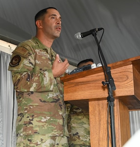 Maj. Nicholas Velazquez Jr. speaks to 433rd Aircraft Maintenance Squadron Airmen after assuming command Sept. 10, 2022, during a change of command ceremony at Joint Base San Antonio-Lackland, Texas. The mission of the 433rd AMXS is to provide on-equipment maintenance support to assigned C-5M Super Galaxy aircraft. (U.S. Air Force photo by Airman 1st Class Mark Colmenares)