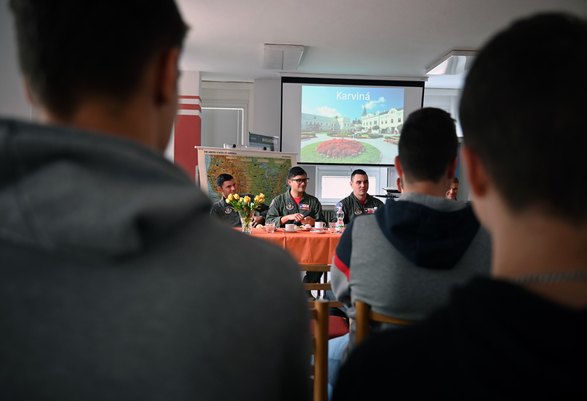Members of the 68th Airlift Squadron sit on a panel during a school visit at the Secondary Vocational School Karvina, in Hranice, Czech Republic, Sept. 16, 2022. SPS is a technical school focused on engineering, information technology and electronics. (U.S. Air Force photo by Staff Sgt. Monet Villacorte)