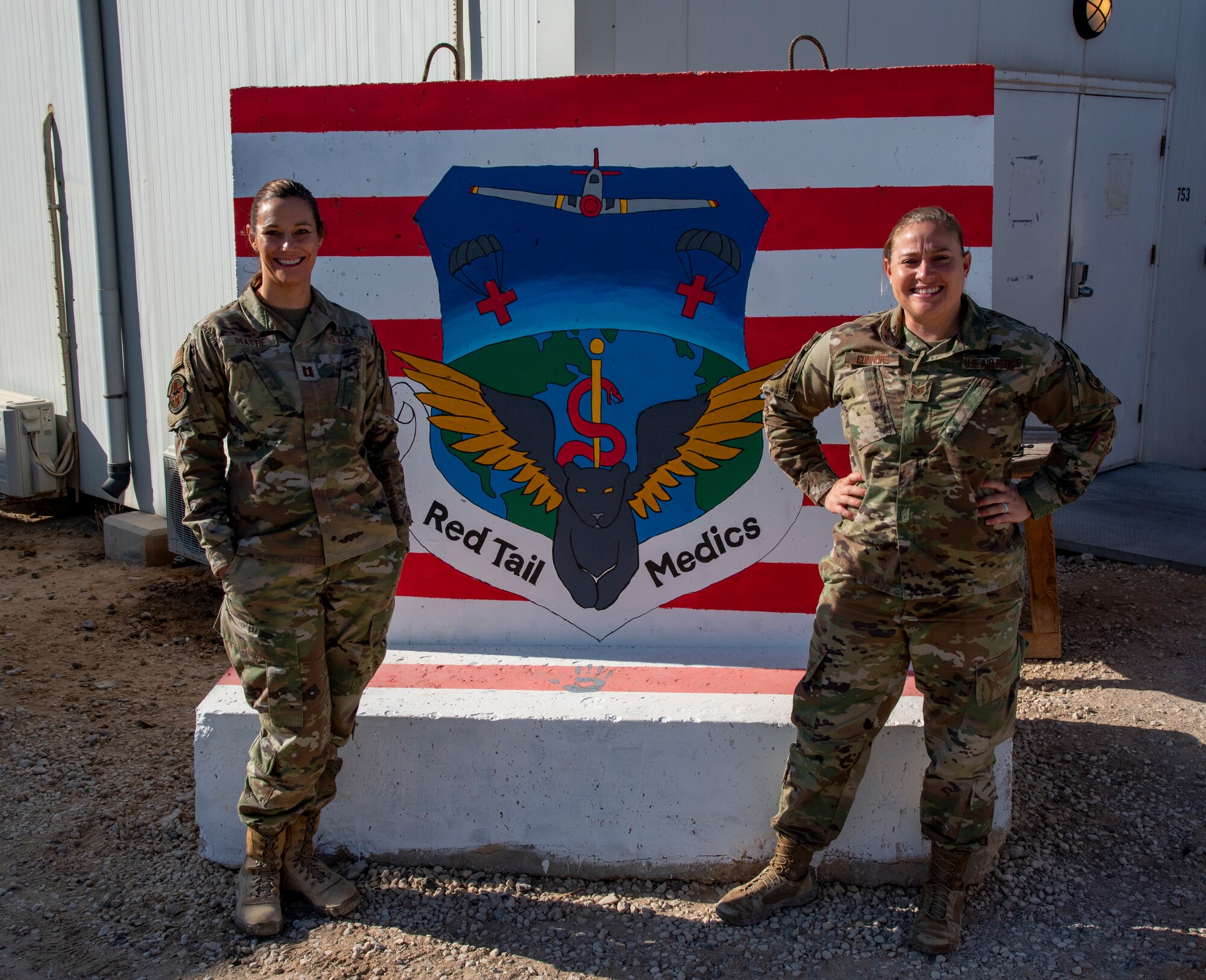 U.S. Air Force Capt. Suzan Beattie, 332d Expeditionary Medical Squadron and Tech. Sgt. Michelle Connors, mental health technician with the at an undisclosed location in Southwest Asia, Sept. 9, 2022. They are raising suicide awareness through the month of September at the 332d Air Expeditionary Squadron. (U.S. Air Force photo by: Tech. Sgt. Jim Bentley)