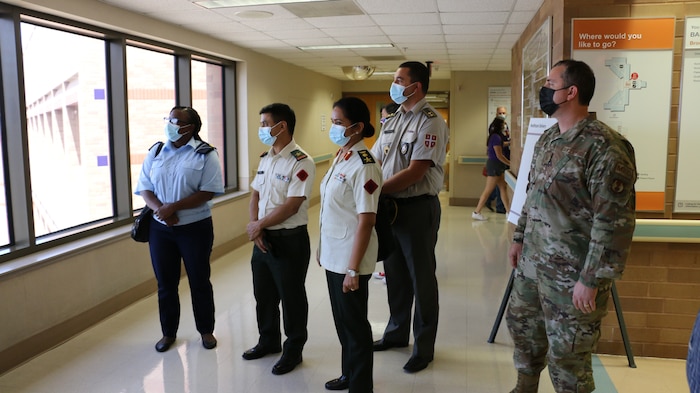 Students from Angola, Fiji and Nepal tour 
the San Antonio Military Medical Center, Texas, as part of the Executive Healthcare 
Resource Management Defense Institute for Medical Operations resident course held, August 2022. (U.S. Air Force photo / Joshua Moreno)