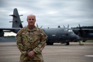 Chief Master Sgt. James Pace, 193rd Special Operations Group senior enlisted leader poses for a portrait in front of an EC-130J Commando Solo Sept. 28, 2022 in Middletown, Pa.