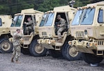 Virginia National Guard Soldiers prepare for possible severe weather from Hurricane Ian Sept. 30, 2022, in Powhatan, Virginia. Soldiers assigned to the 180th Engineer Company, 276th Engineer Battalion, 329th Regional Support Group, were prepared to provide high mobility transport and clear debris if needed.