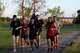 Team Minot Airmen participate in a POW/MIA commemoration run, Minot Air Force Base, North Dakota, Sept. 29, 2022.